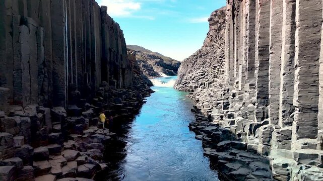 Encounter the stunning rock formations and tranquil waters of Studlagil Canyon, a hidden gem in Iceland. Marvel at the unique basalt columns and serene river surrounded by dramatic landscapes.