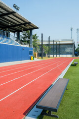 Running track in sport stadium for training and competition. Sport concept.