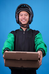 Smiling Asian Motorcycle Taxi Driver in Jacket and Helmet Delivering Two Stacked Cardboard Boxes...