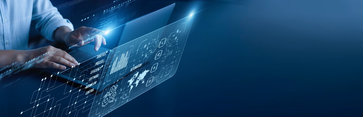 Automation network connection concept. Engineer hand working on a laptop computer with a graphical robotic process workflow optimization efficiency control system operation analytics.