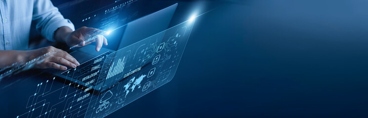 Cloud Computing network connection concept. IT engineer hand working on a laptop computer with graphical server storage virtualization data backup scalability.