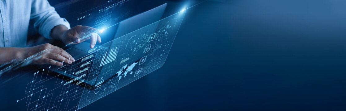 Robotics network connection concept. Automation engineer hand working on laptop computer with graphical mechanical design control system motion programming industrial technology interface.