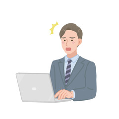 PC画面を見てショックを受けるビジネスマン