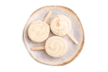 Сhocolate Ice cream in white glaze isolated on white, top view, flat lay, close up