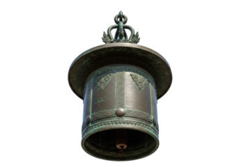 Isolated ornate bronze hanging bell with intricate details and aged patina on display