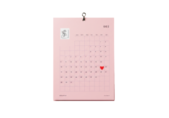 Isolated desk calendar page marked with heart for February 24, a sentimental event date