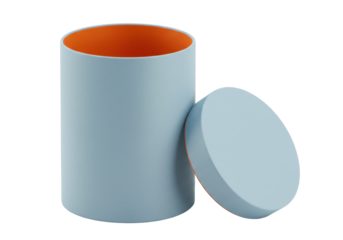 Isolated round light blue box with orange interior and lid next to it on a studio set