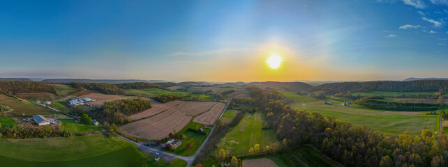 Aerial landscape of corn fields farmland mountains sunset rural Appalachia Central Pennsylvania © Andrew