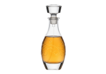 Isolated decanter with clear stopper filled with golden liquid for table accent and party bar