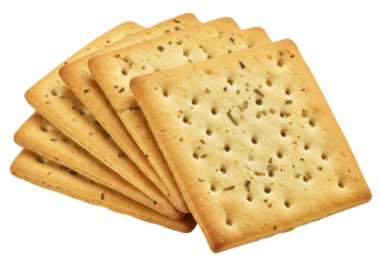 Isolated savory square crackers seasoned with herbs, a light snack or appetizer biscuit