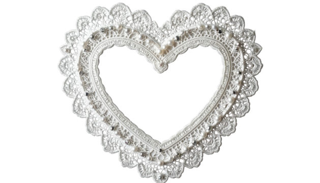 Lacy, white heart frame with scalloped edges, set against a black backdrop, suggests romance or celebration