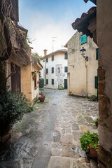 Fototapeta premium Between ancient history, art, and nature. The island of Grado in winter. The village and the sea. Friuli