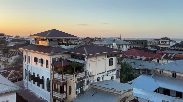 View of Stone town Mji Mkongwe Zanzibar city UNESCO world heritage sit tanzania town sunset skyline
