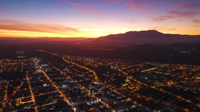 Aerial Sunset Fire Hyperlapse fly Ovalle Limari Capital City in Coquimbo Chile, Establishing Drone, Motion Time Lapse