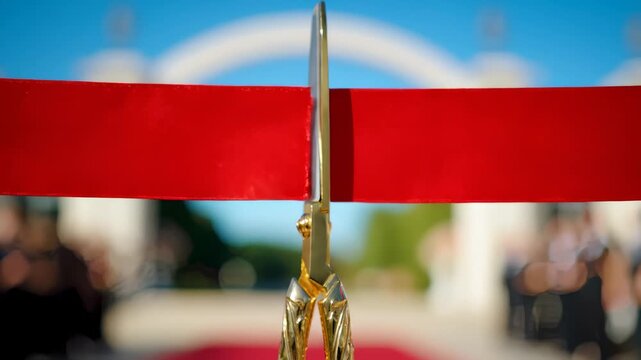 Cutting a Red Ribbon With Golden Scissors at a Ceremony - Powered by Adobe