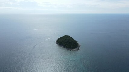 Aerial and Ground View of Kata Beach in Phuket, Thailand: Tropical Paradise with Turquoise Waters, Traditional Long-Tail Boats, Beach Hammocks,Banana Boat Rides,Scenic Coastal Town with Nearby Islands - Powered by Adobe