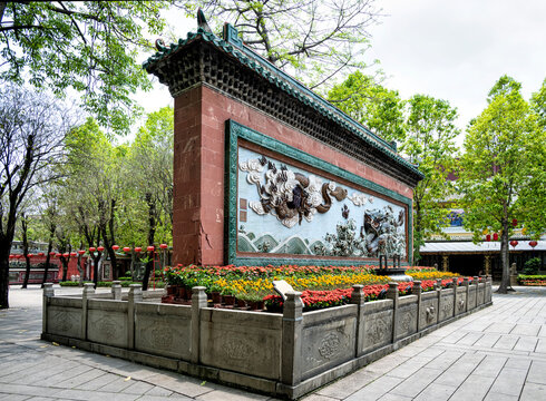 Double Dragon Wall at Foshan Ancestral Temple and greenery create a unique vibe