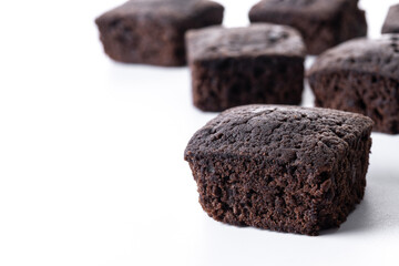 Homemade chocolate brownies isolated on white background. Copy space