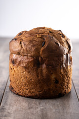 Traditional Italian Panettone on wooden table