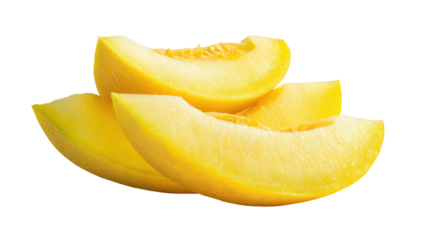 Close-up of golden melon slices, layered and vibrant, isolated against a black background