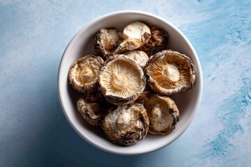 Fototapeta premium Dried shiitake mushrooms in bowl for cooking ingredient