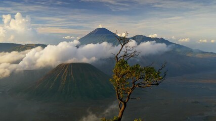 Bromo volcano mountain sunrise view reveals majestic landscape and vibrant clouds in East Java Indonesia - Powered by Adobe