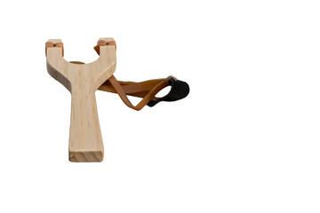 Wooden slingshot with rubber bands and aiming pouch, isolated on a transparent background