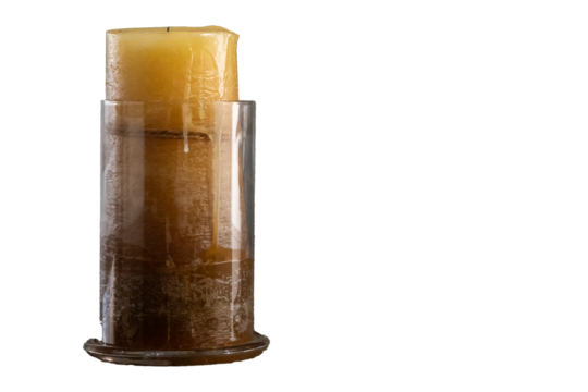 Melting candle in a clear glass container on a transparent background, offering ample copy space