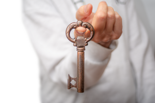 Buy a new home with a vintage key in hand, signifying new beginnings in real estate