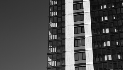Construction of a high-rise apartment building, facade of affordable housing,black and white