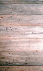 Weathered wooden plank texture with natural grain and knots, rustic and aged surface