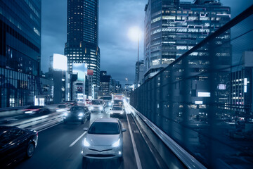 Obraz premium A night traffic jam on the city highway in Tokyo, Japan