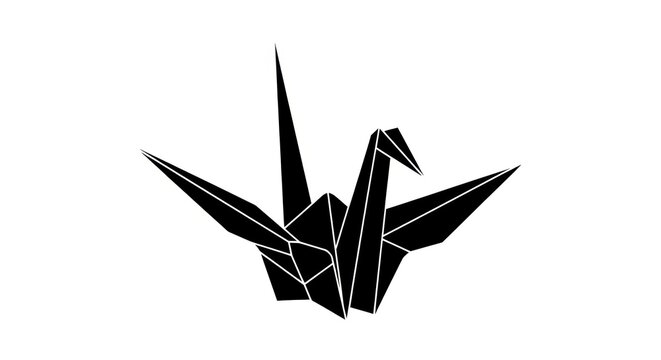 Black origami paper crane bird isolated on a white background.