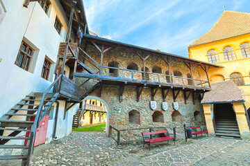 Prejmer Fortified Church, a UNESCO heritage site in Transylvania, Romania, displaying its Romanesque Lutheran design, wooden balconies, and defensive walls. UNESCO site of Romania