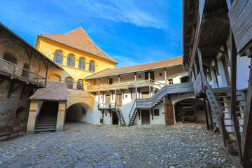 Prejmer Fortified Church, a UNESCO heritage site in Transylvania, Romania, displaying its Romanesque Lutheran design, wooden balconies, and defensive walls. UNESCO site of Romania