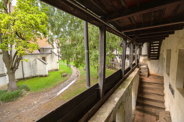 Prejmer Fortified Church, a UNESCO heritage site in Transylvania, Romania, displaying its Romanesque Lutheran design, wooden balconies, and defensive walls. UNESCO site of Romania