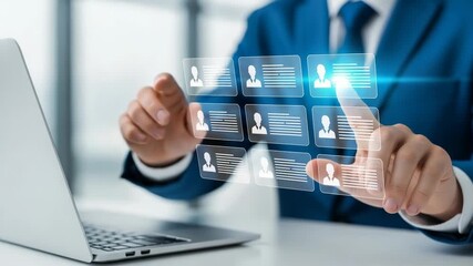 Businessman selecting profile from digital interface on a laptop - Powered by Adobe