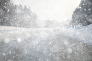 snowfall on a winter road, abstract background, blurred highway backdrop snowy landscape