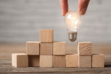 Building Blocks Lightbulb Idea Concept Inspiration Hand Stacking Cubes Strategy Thinking Creative Process Development Success Planning Solution