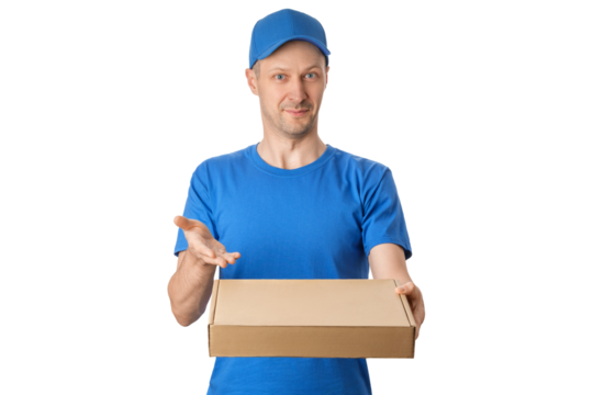 A delivery worker in a blue shirt and cap stands with a brown box, smiling and gesturing with one hand