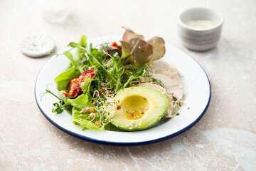 Green salad with chicken and avocado	
