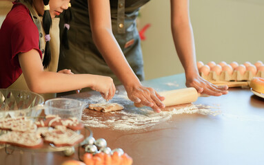 Baking Memories Parent and Child Rolling Dough Together