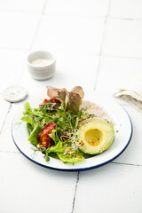 Green salad with chicken and avocado