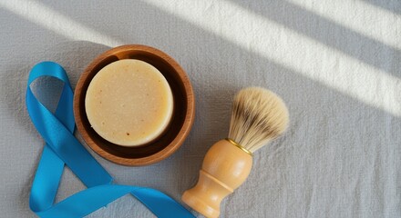 traditional barber tools with soap bar and brush on a textured cloth surface