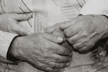 Hands of father, mother and daughter together &mdash; family love and unity