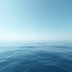 Obraz premium Blue sea water with small waves meets clear light blue sky. Calm ocean surface extends to distant horizon. Peaceful natural marine landscape offers vast open space. Clean environment background for