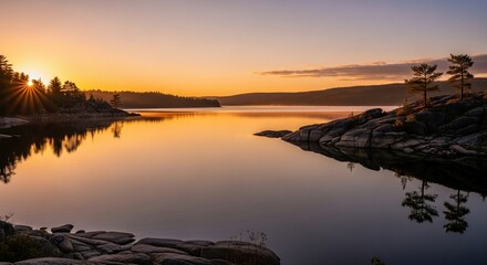 Scenic lake at sunrise with reflections and rocky shoreline landscape