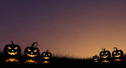 Silhouette of several glowing jack-o'-lanterns on dark grass against a gradient sky, symbolic of Halloween celebration and spooky atmosphere