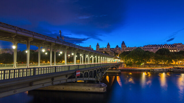 View of pont de Bir-Hakeim day to night timelapse - a bridge that crosses the Seine River. Paris, France