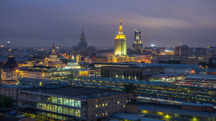 Naklejka premium Evening top view of three railway stations day to night timelapse at the Komsomolskaya square in Moscow, Russia